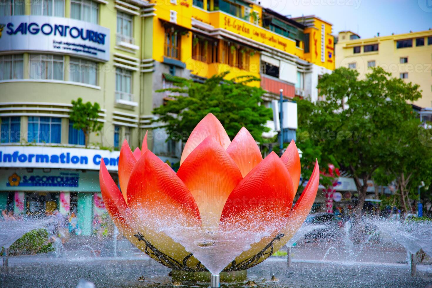 A fountain at the downtown at Nguyen Hue street in Ho Chi Minh long shot photo