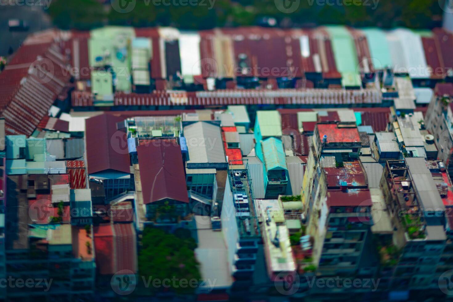 A high angle view of miniature cityscape at the downtown in Ho Chi Minh daytime tiltshift photo