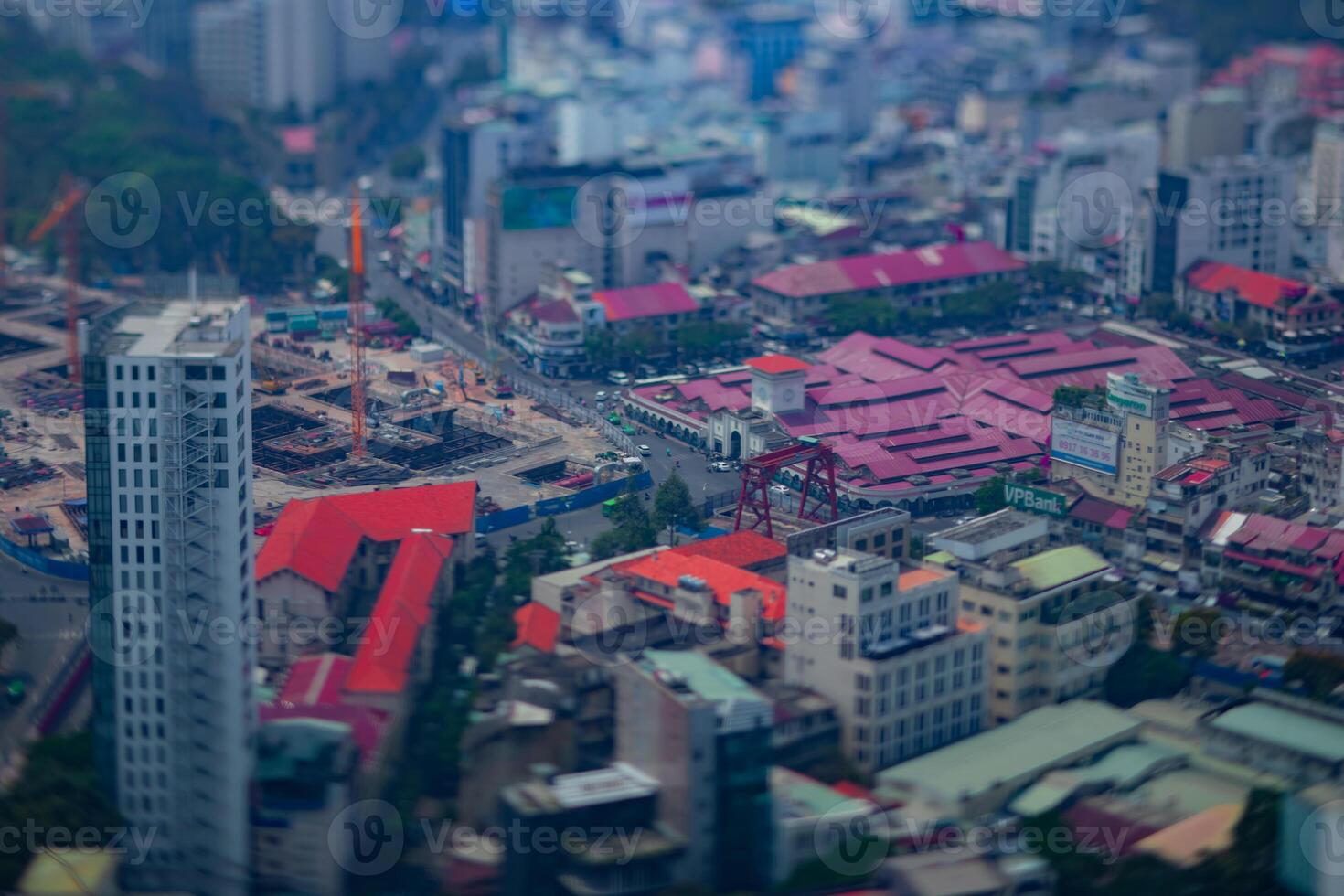 A high angle view of miniature cityscape at the downtown in Ho Chi Minh daytime tiltshift photo