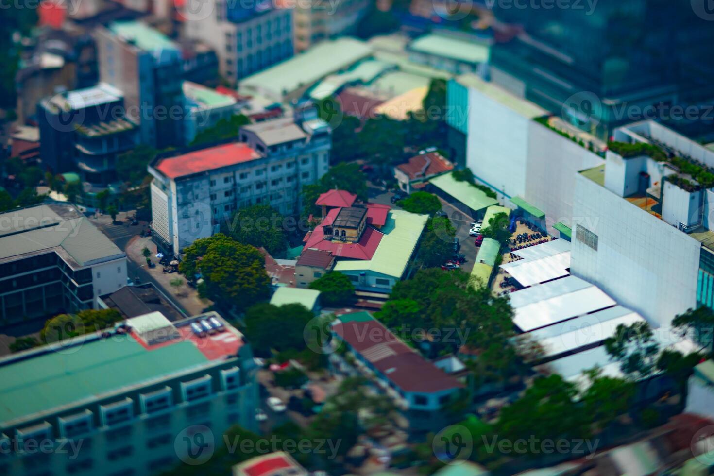 A high angle view of miniature cityscape at the downtown in Ho Chi Minh daytime tiltshift photo