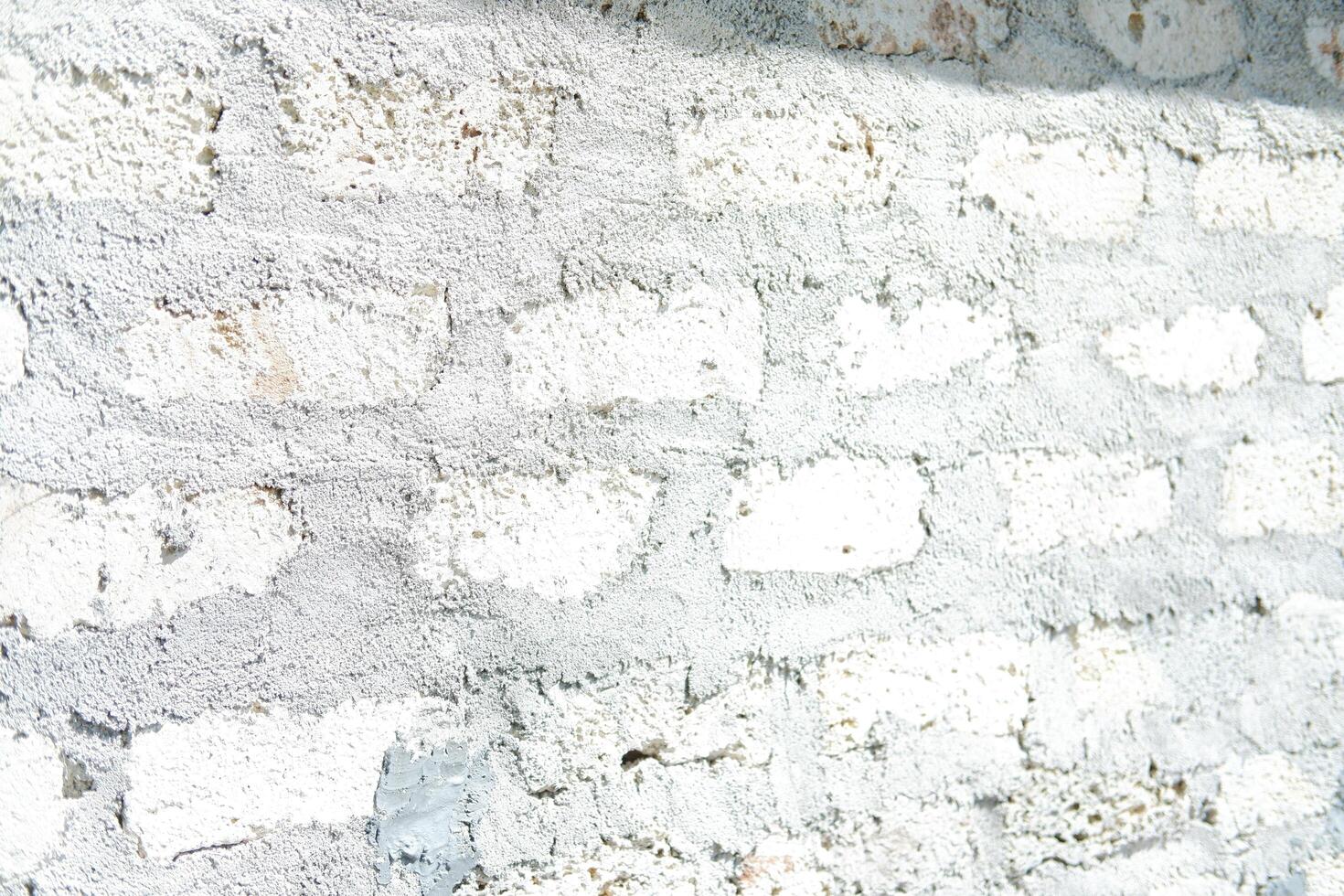 stacks of concrete bricks or blocks arranged on the ground photo