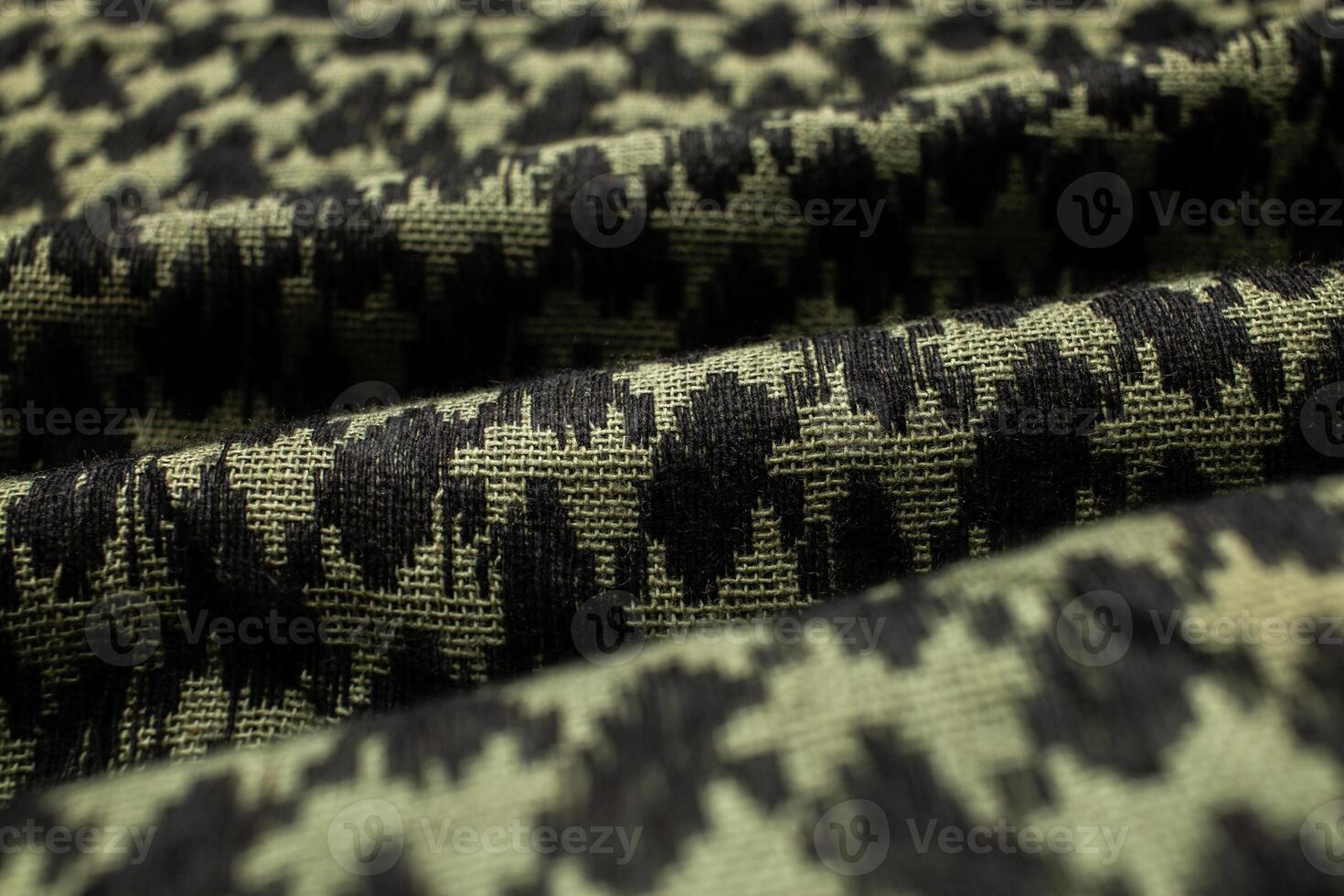 Keffieh scarf. The texture of the cotton traditional symbolic arabian scarf. Khaki back. photo
