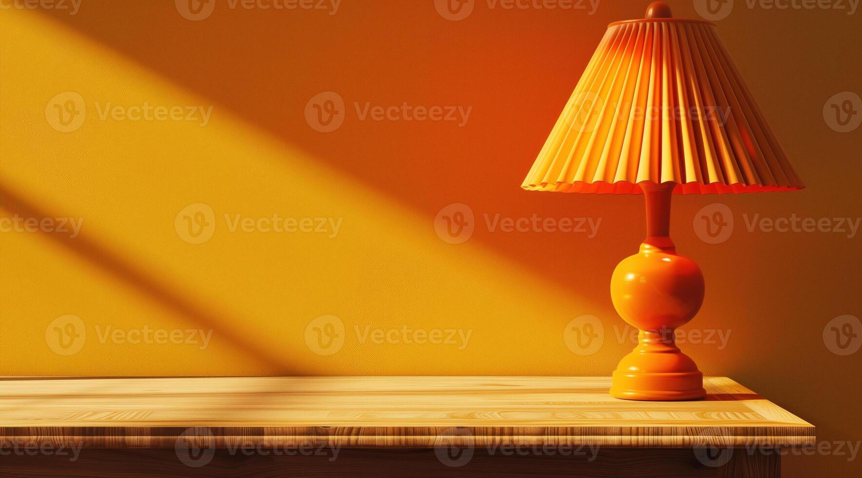 Table lamp with yellow lampshade stands on wooden table. Copyspace. Yellow back photo