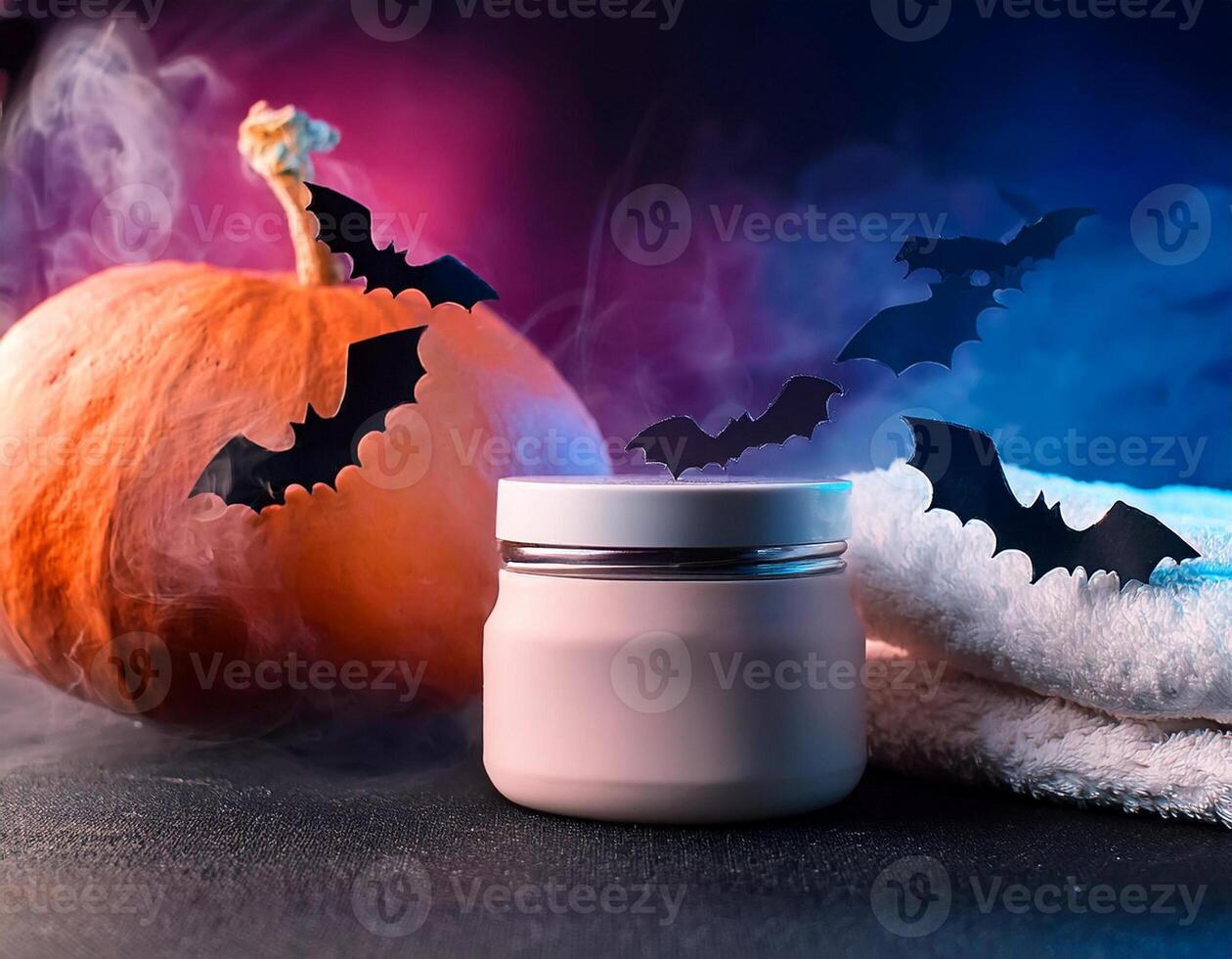 Cosmetic container with pumpkin and bats, halloween concept of skin care photo