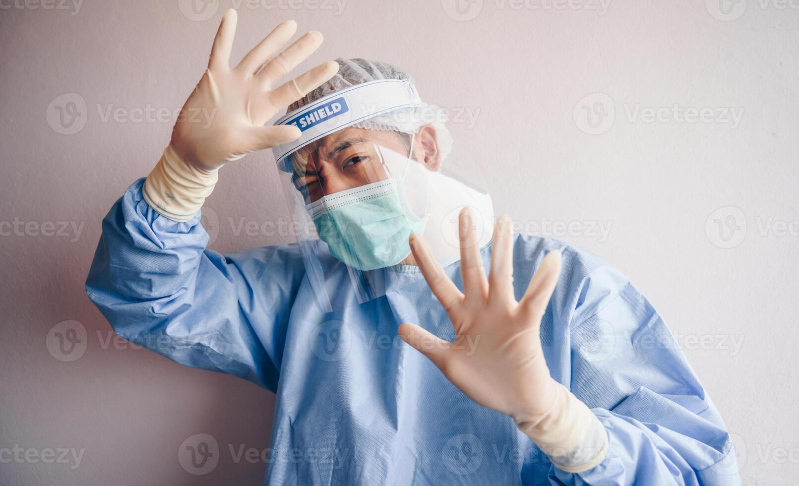 Healthcare worker having stress after he was bullying from other in hospital. Bullying can range from mild teasing through to more serious abuse. photo