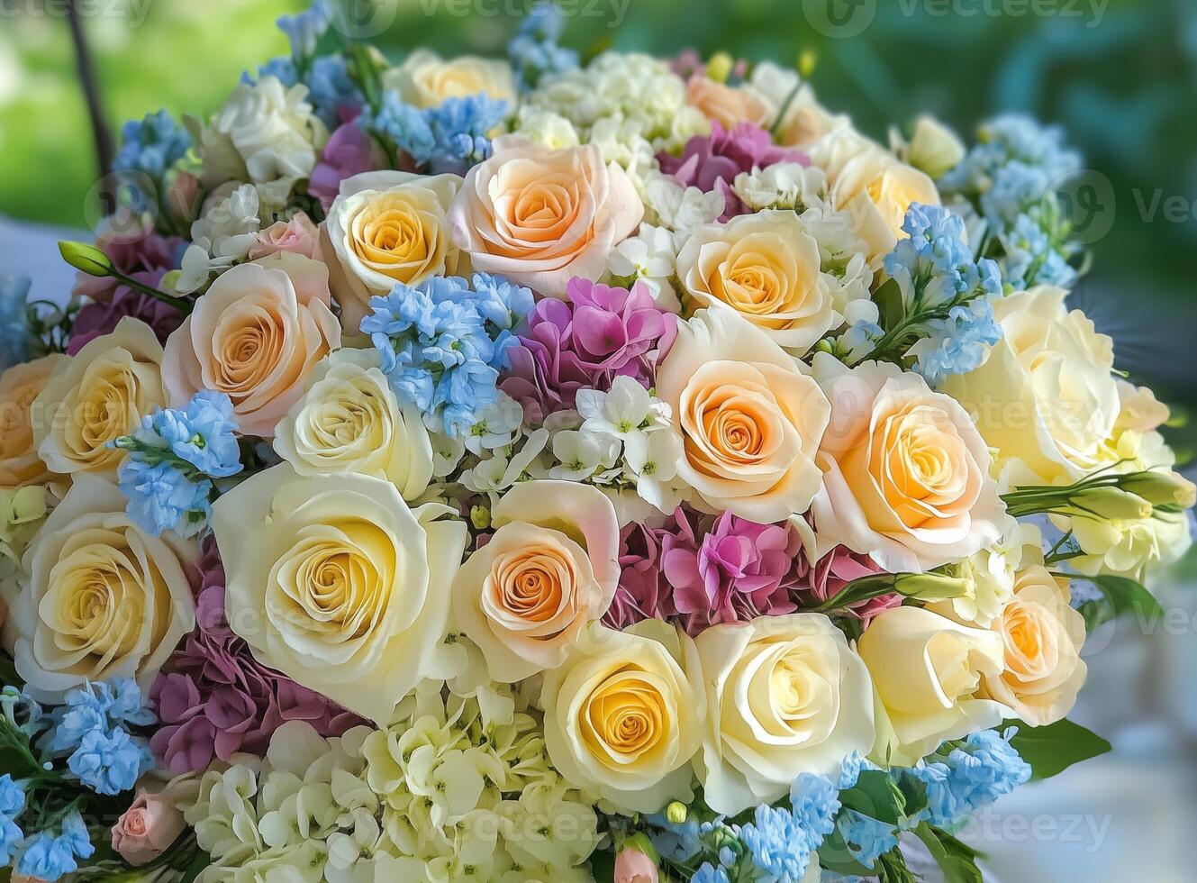 A Stunning Display of Colorful Roses and Hydrangeas in Bloom photo