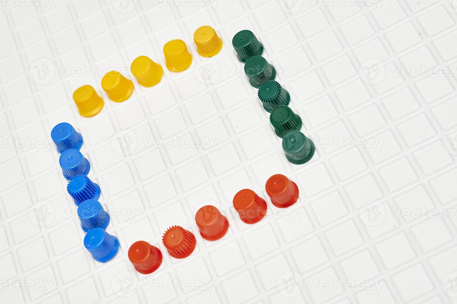 Multi colored caps lids for ketchup, mayonnaise, mustard, sauces photo