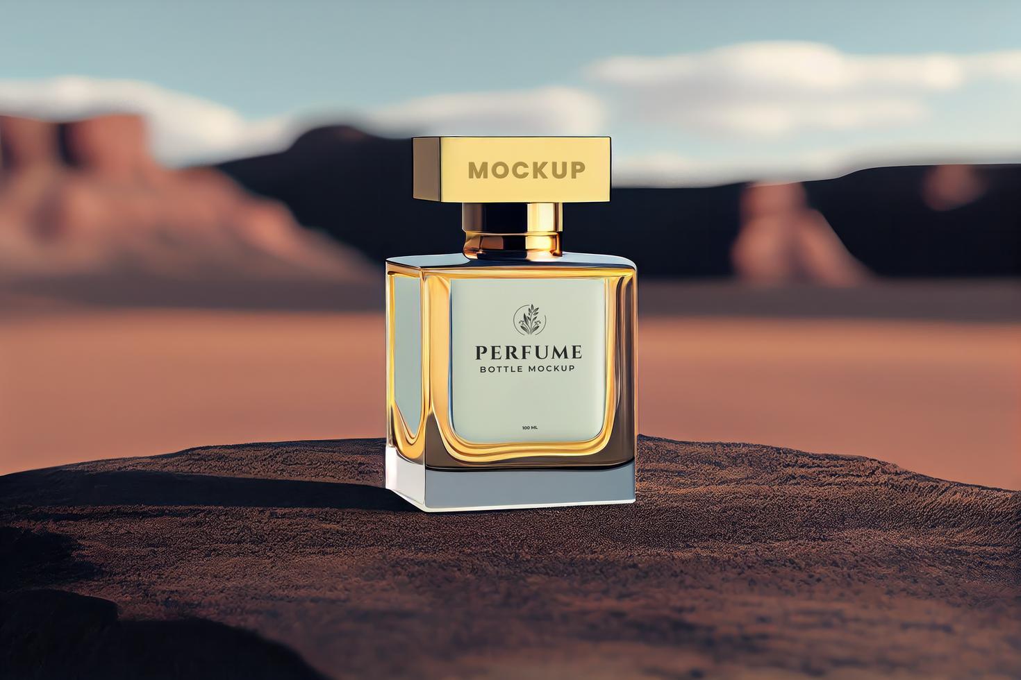 A bottle of perfume sitting on a rock in the desert psd
