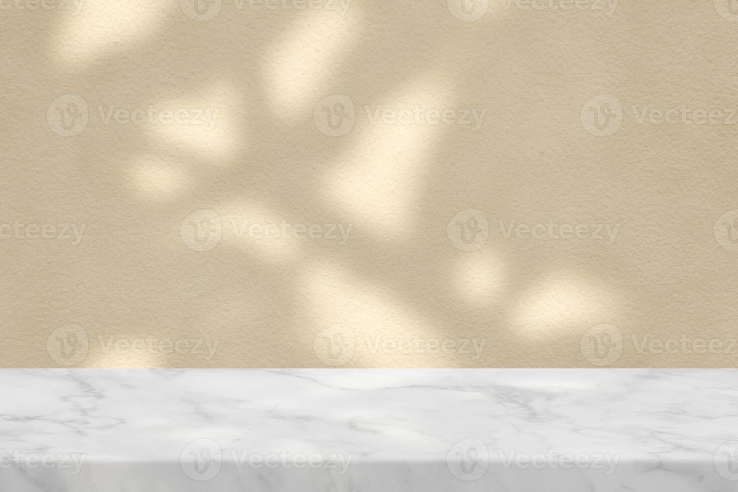 White Marble Table with Tree Shadow on Concrete Wall Texture Background in Beige Tone photo