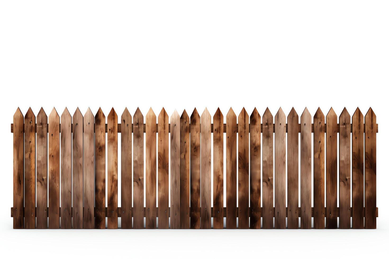 A tall wooden fence made of vertical planks with pointed tops. The fence is weathered and has a natural wood grain texture. photo