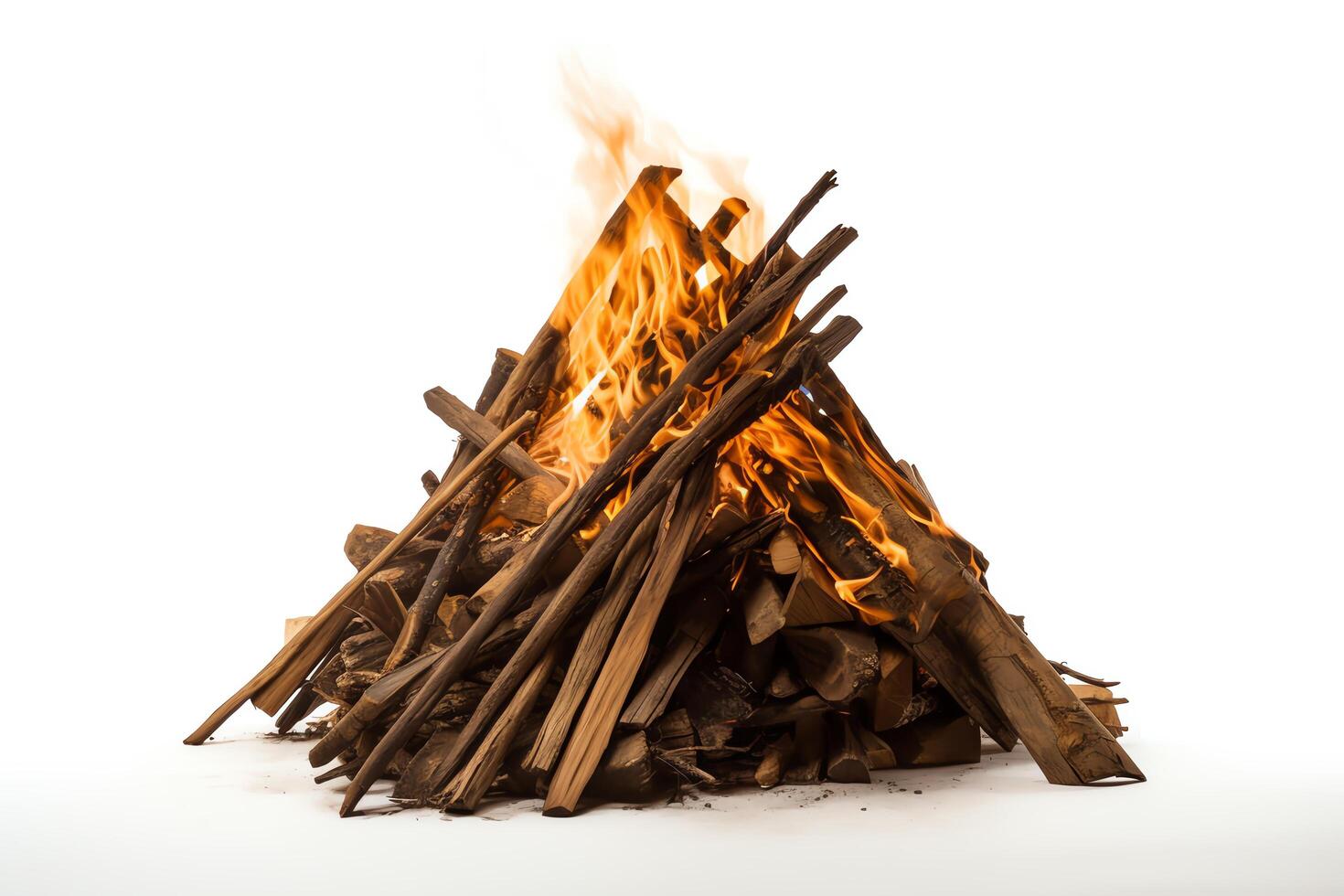A large bonfire burns brightly, casting a warm glow over the surrounding area photo