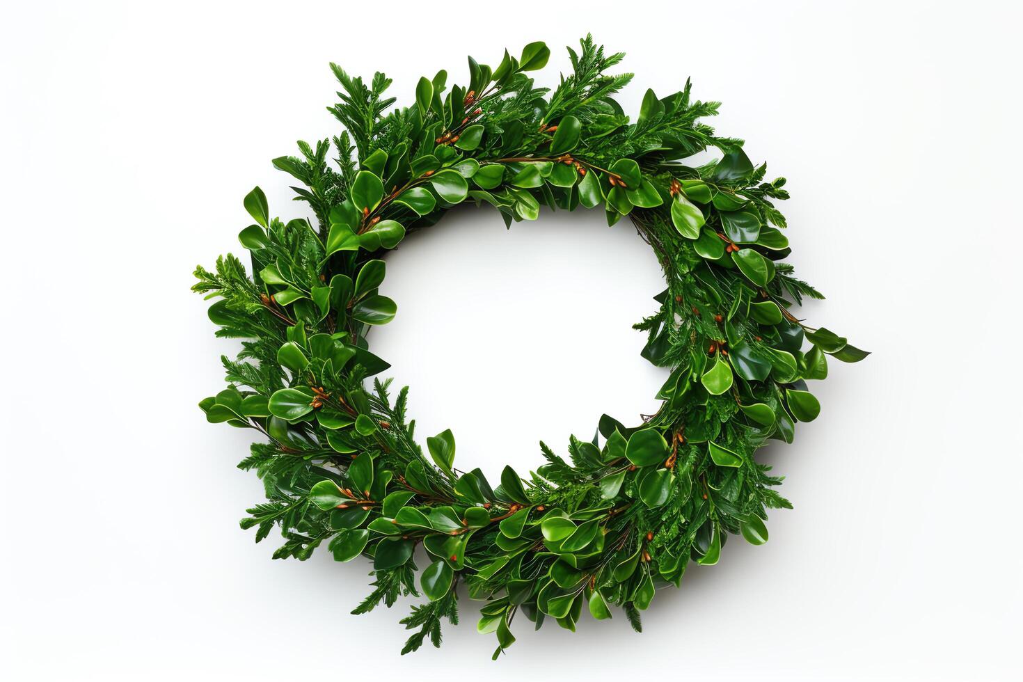 A beautiful wreath of green leaves and red berries. Perfect for Christmas or any other special occasion. photo