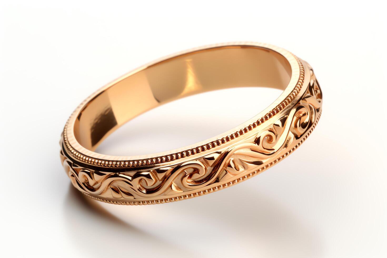 Design a wedding band with a Celtic inspired pattern, it should be made of yellow gold and have a width of 4mm. The pattern should be engraved on the outer surface of the ring. photo