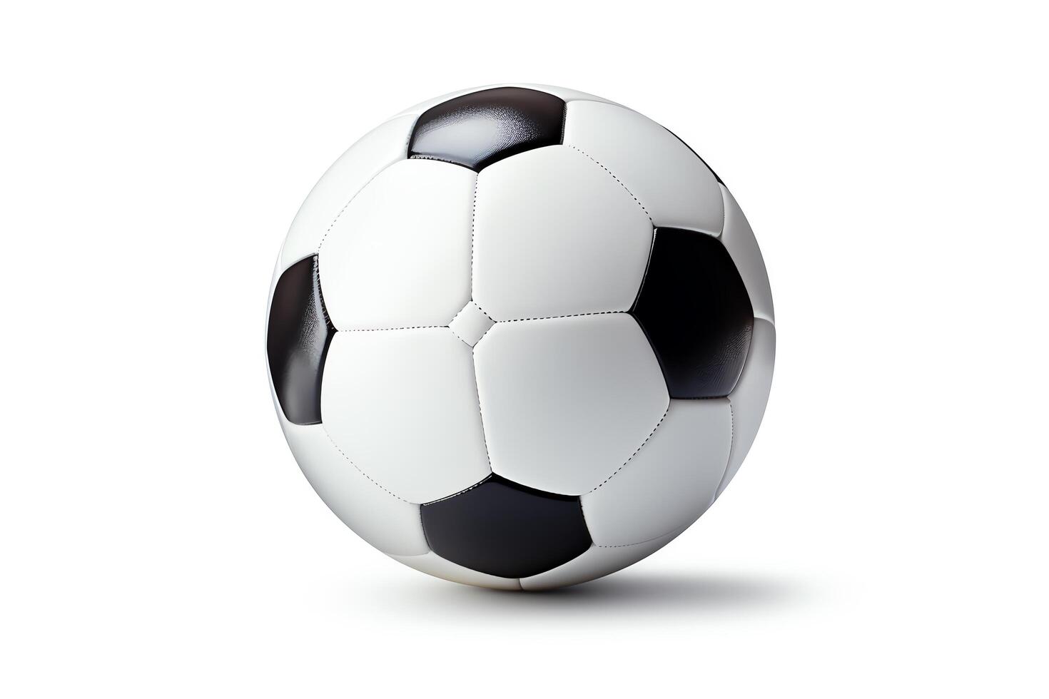 A black and white soccer ball sits on a white background. The ball is perfectly round and has a smooth surface. The ball is inflated and ready to be played with. photo