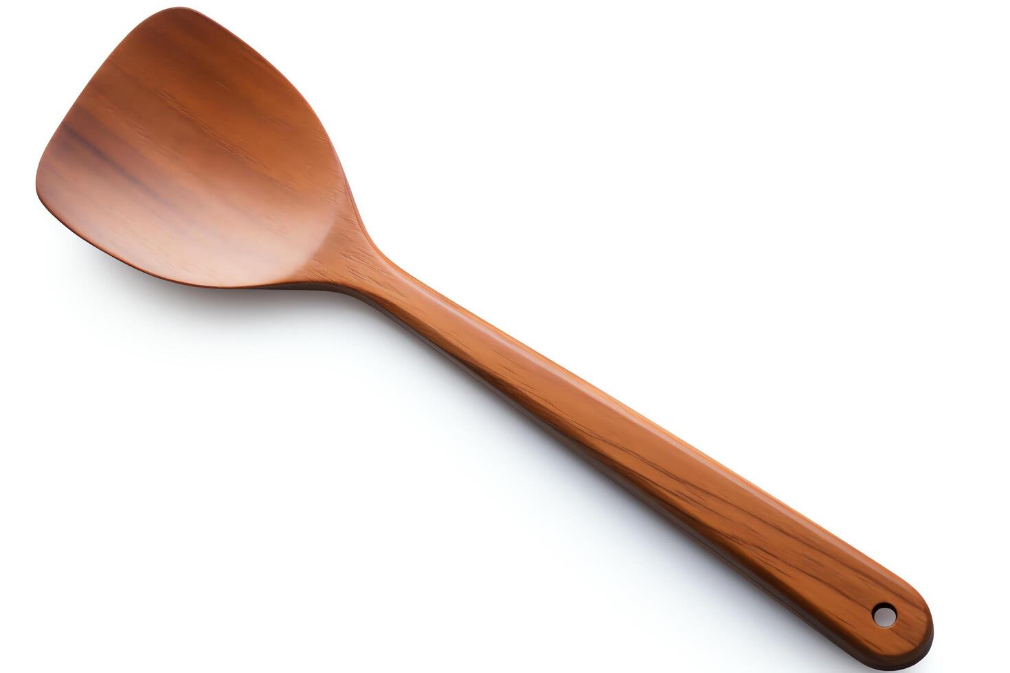 A wooden spatula isolated on a white background. photo