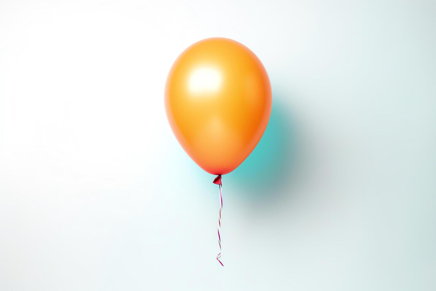 Take a picture of a single, orange balloon floating in the air against a white background. The balloon should be perfectly centered in the frame. photo