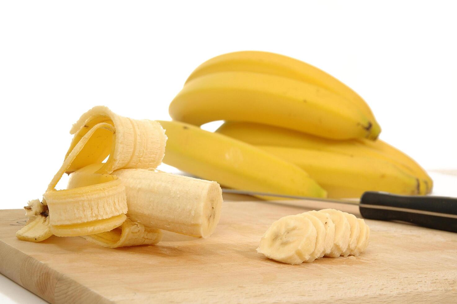 bananas on carving board photo