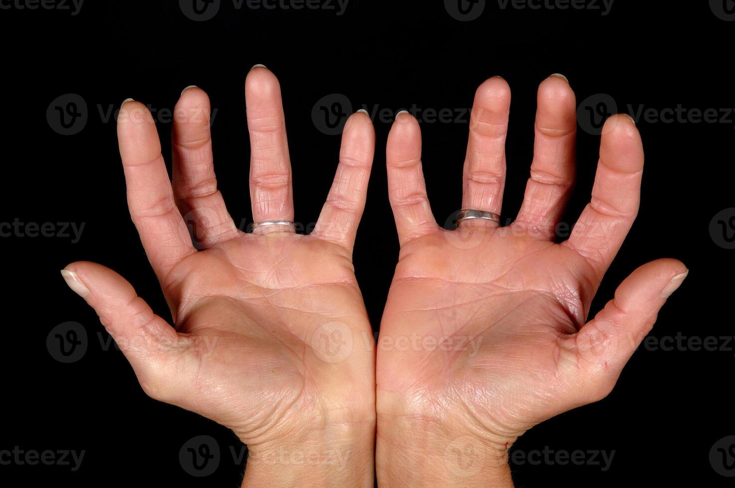 Open hands black background photo
