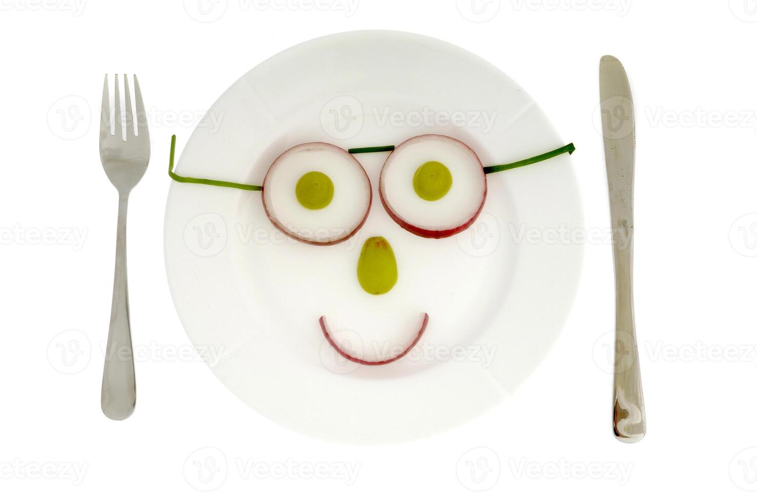 Fruit face on a plate photo