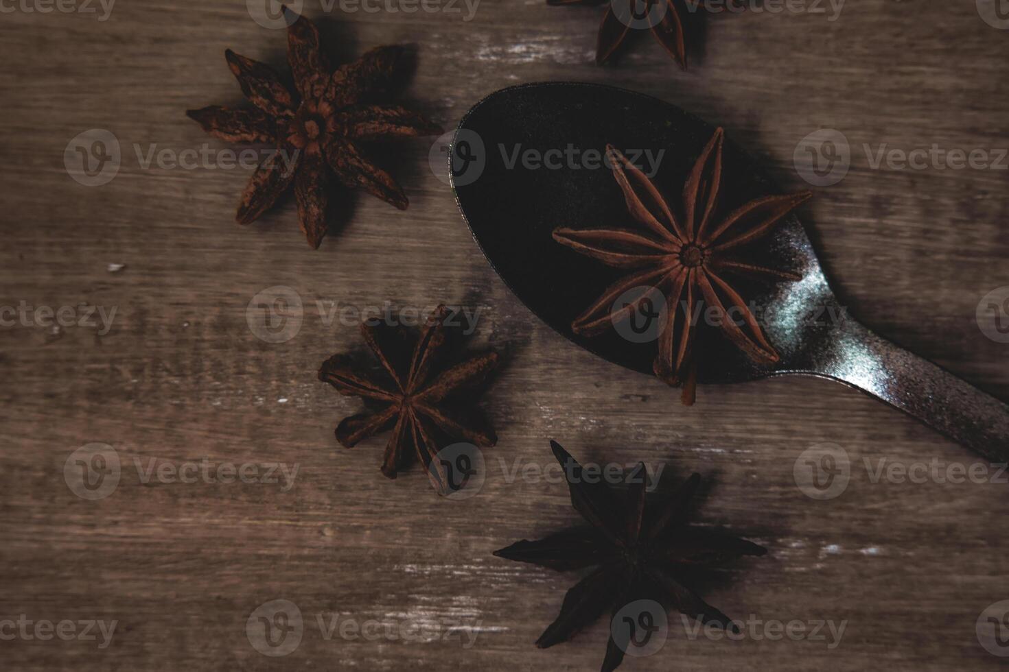 Star Anise on wooden table Background photo