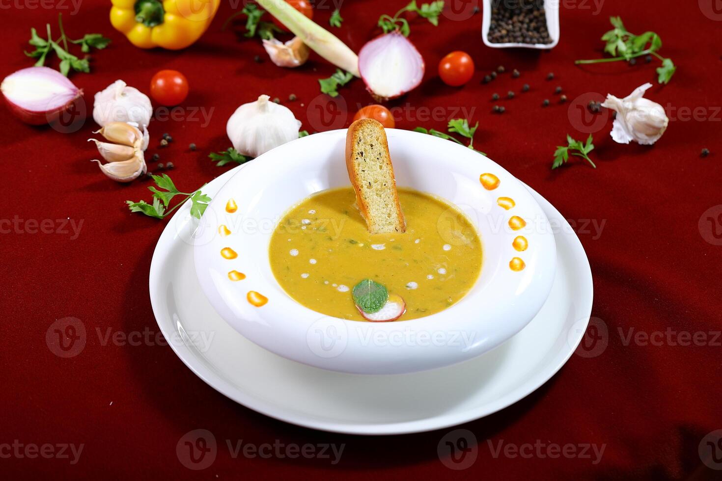 Lentil Soup with Bread served in bowl isolated on red background side view of arabic food photo