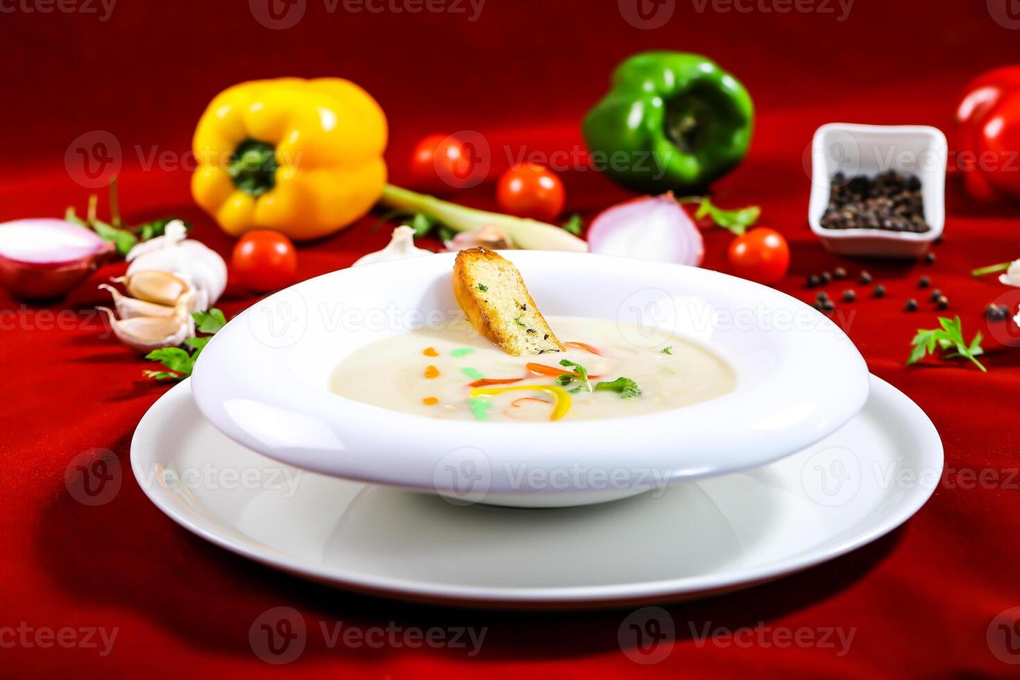 Creamy Mushroom Soup with bread served in bowl isolated on red background closeup side view of arabic food photo