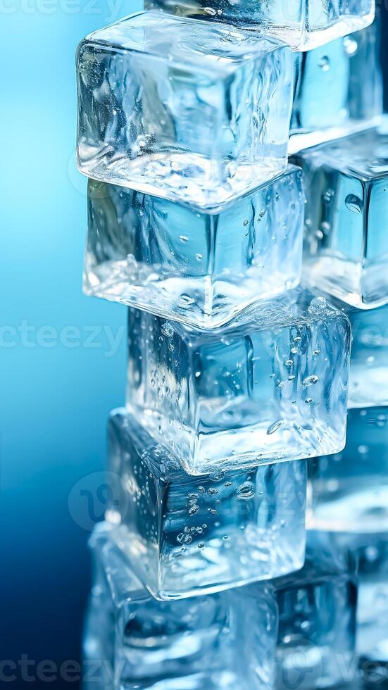 Ice cubes on blue background. Summer concept. photo