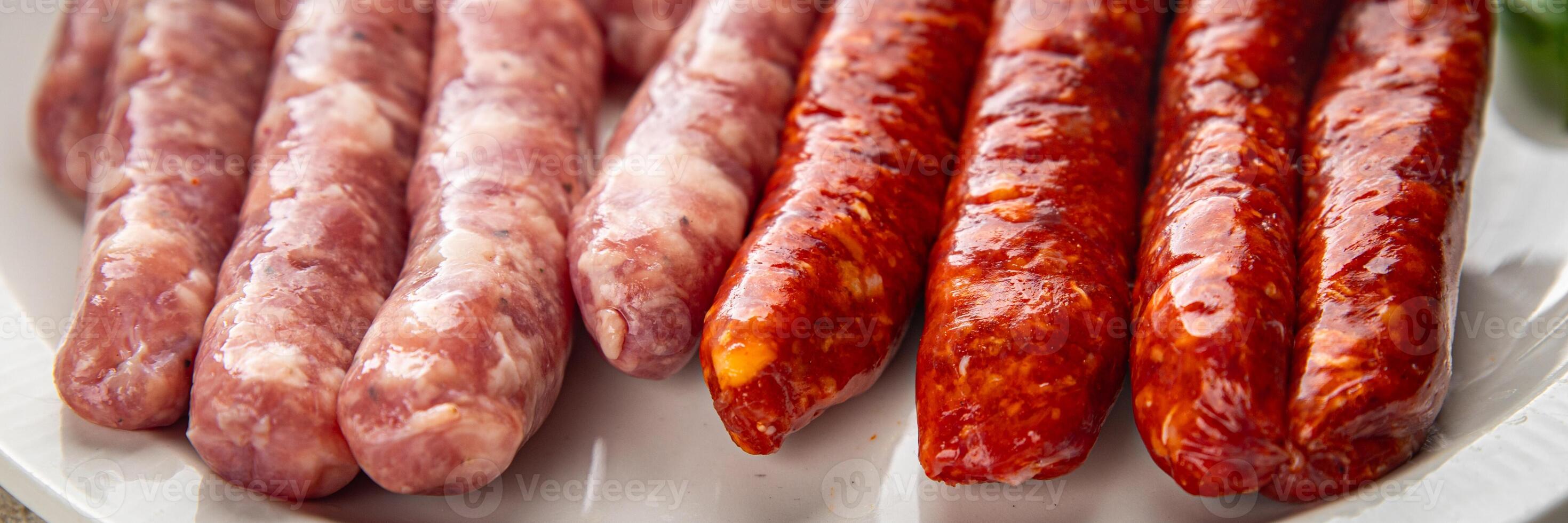 raw sausages beef, pork, chicken, lamb, dish fresh delicious gourmet food background on the table rustic food top view copy space photo
