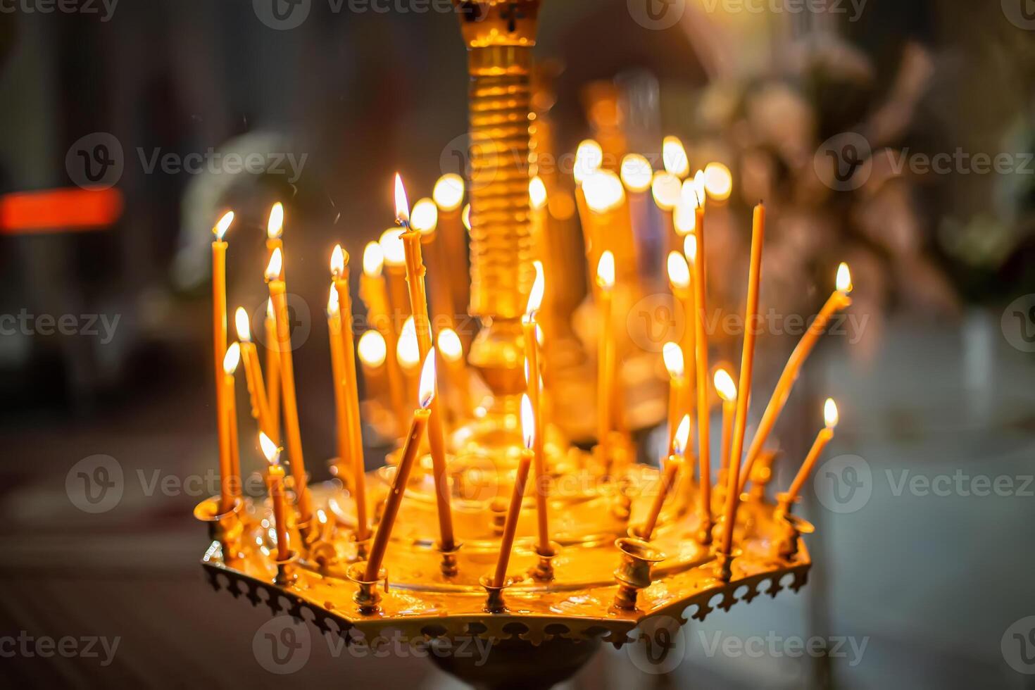 Smoke from the extinct candles. Chandelier with candles in the Church. Background for photobooks about baptism. photo
