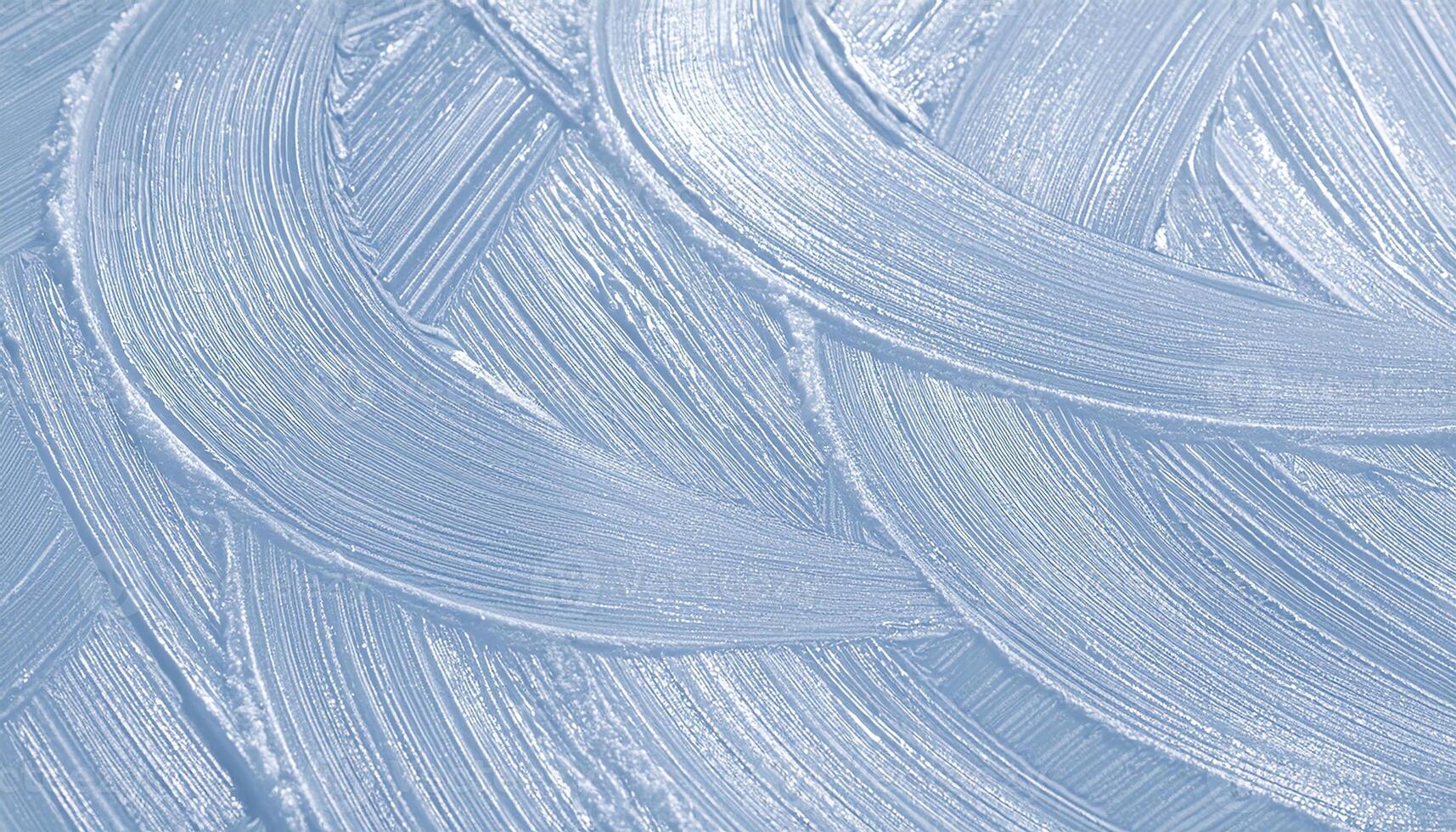 A blue background with white paint strokes photo