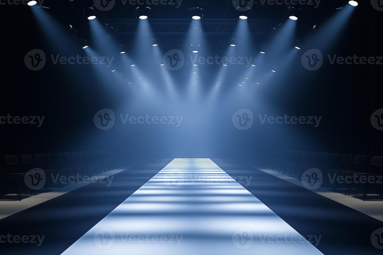runway is illuminated by a series of spotlights photo