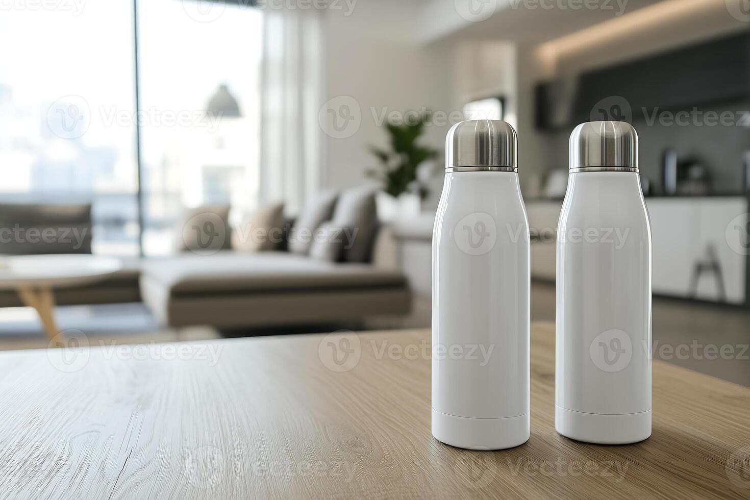 Two white thermoses sit on a wooden table in a modern living room photo