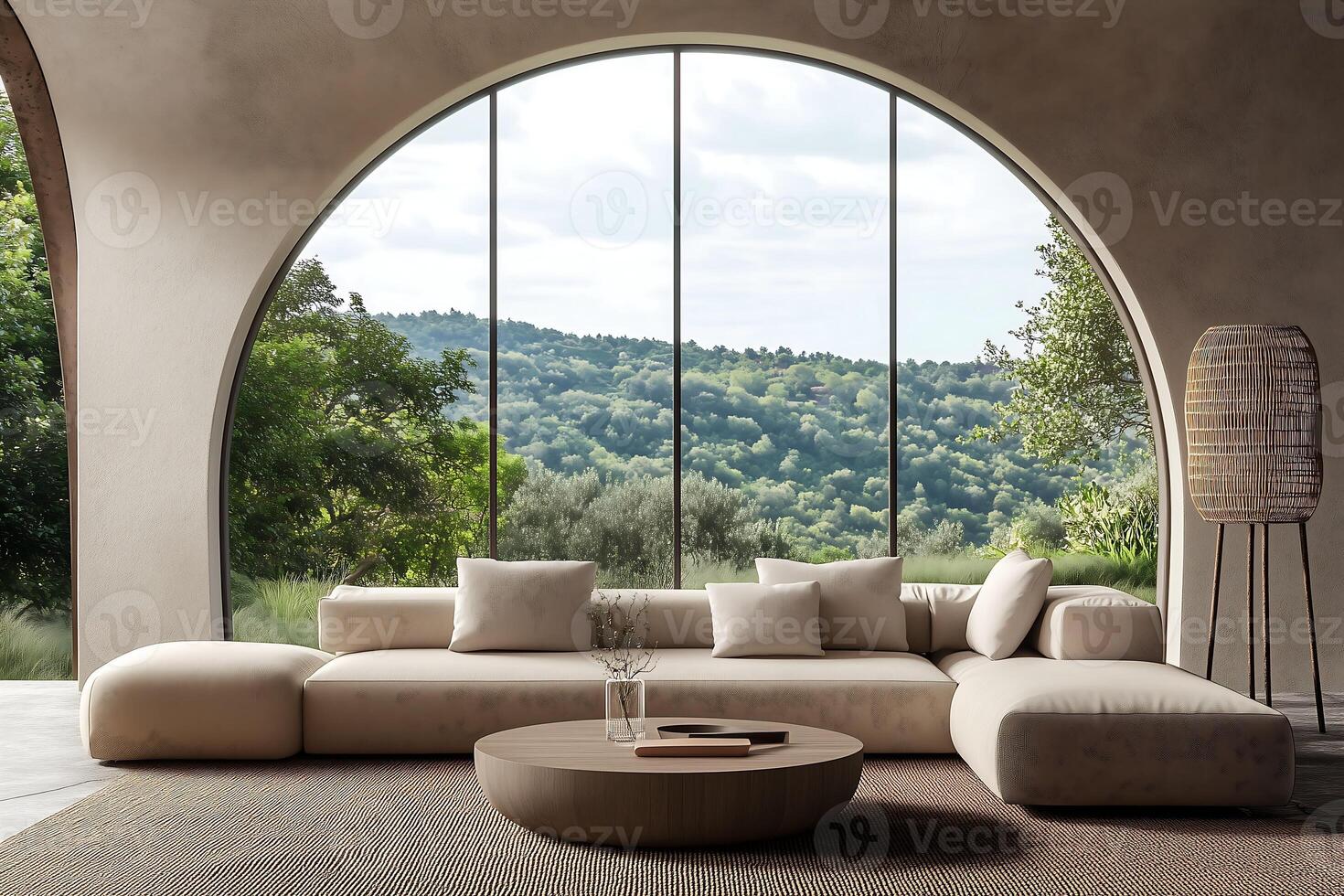 contemporary living space features a modular sofa positioned in front of an expansive arched window overlooking a verdant landscape photo