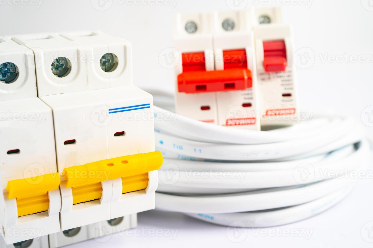 Automatic circuit breaker on white background, control and protect electrical power system. photo