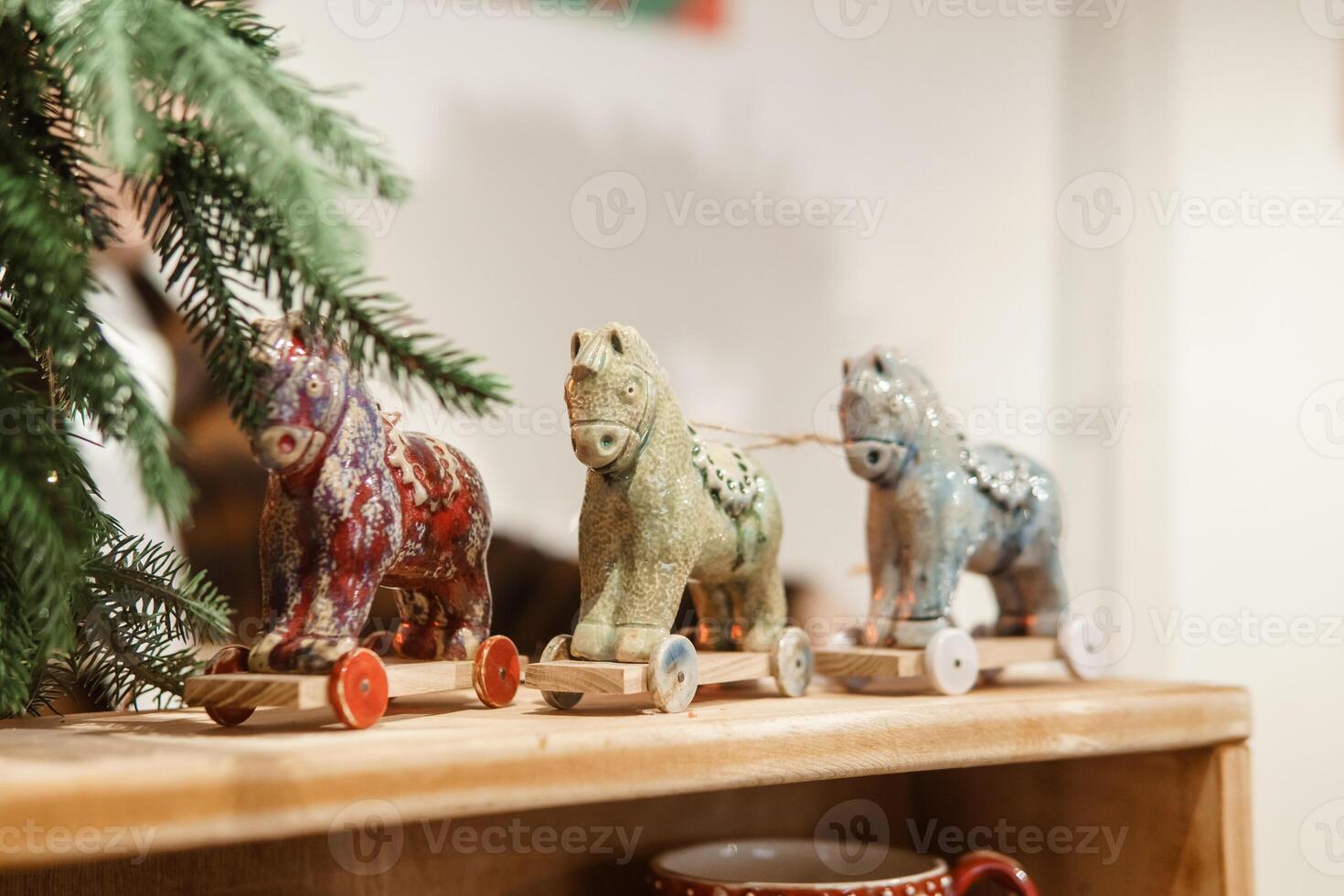 Sale of handmade ceramic Christmas tree toys at the Christmas Fair. Black Friday for the winter holidays. photo
