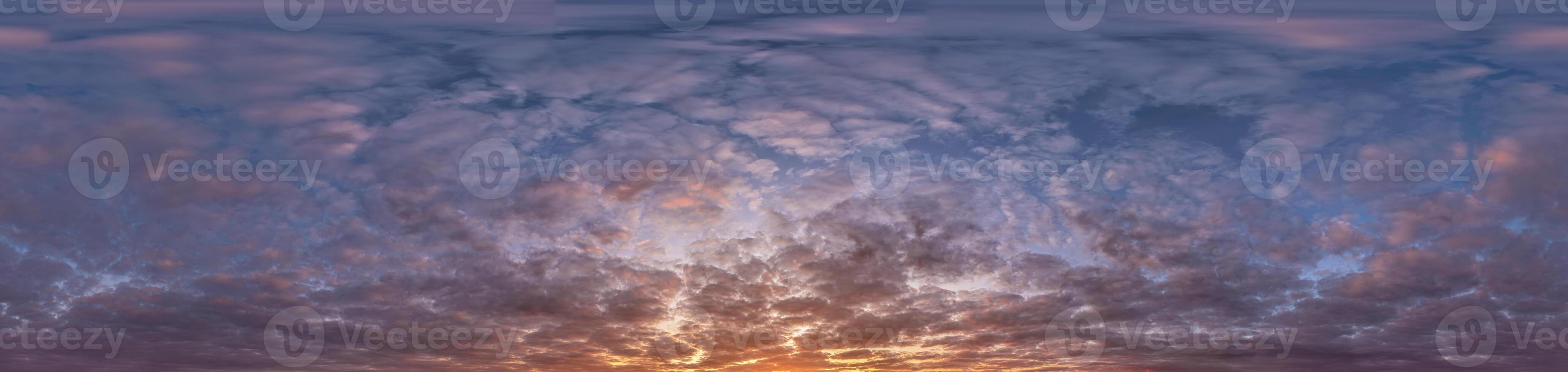 Golden sunset sky panorama Seamless spherical equirectangular 360-degree view with beautiful Stratocumulus clouds, setting sun - for use in 3D graphics as a sky dome or post-processing of drone images photo