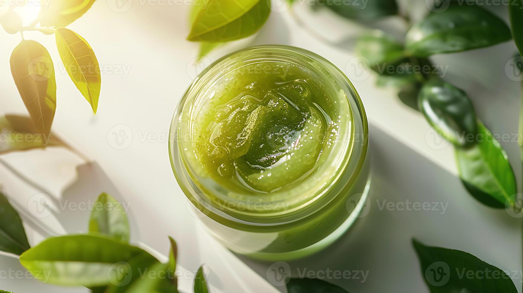 organic green tea face scrub in a container showcased against a simple white backdrop with fresh green tea leaves, perfect for natural skincare routine photo