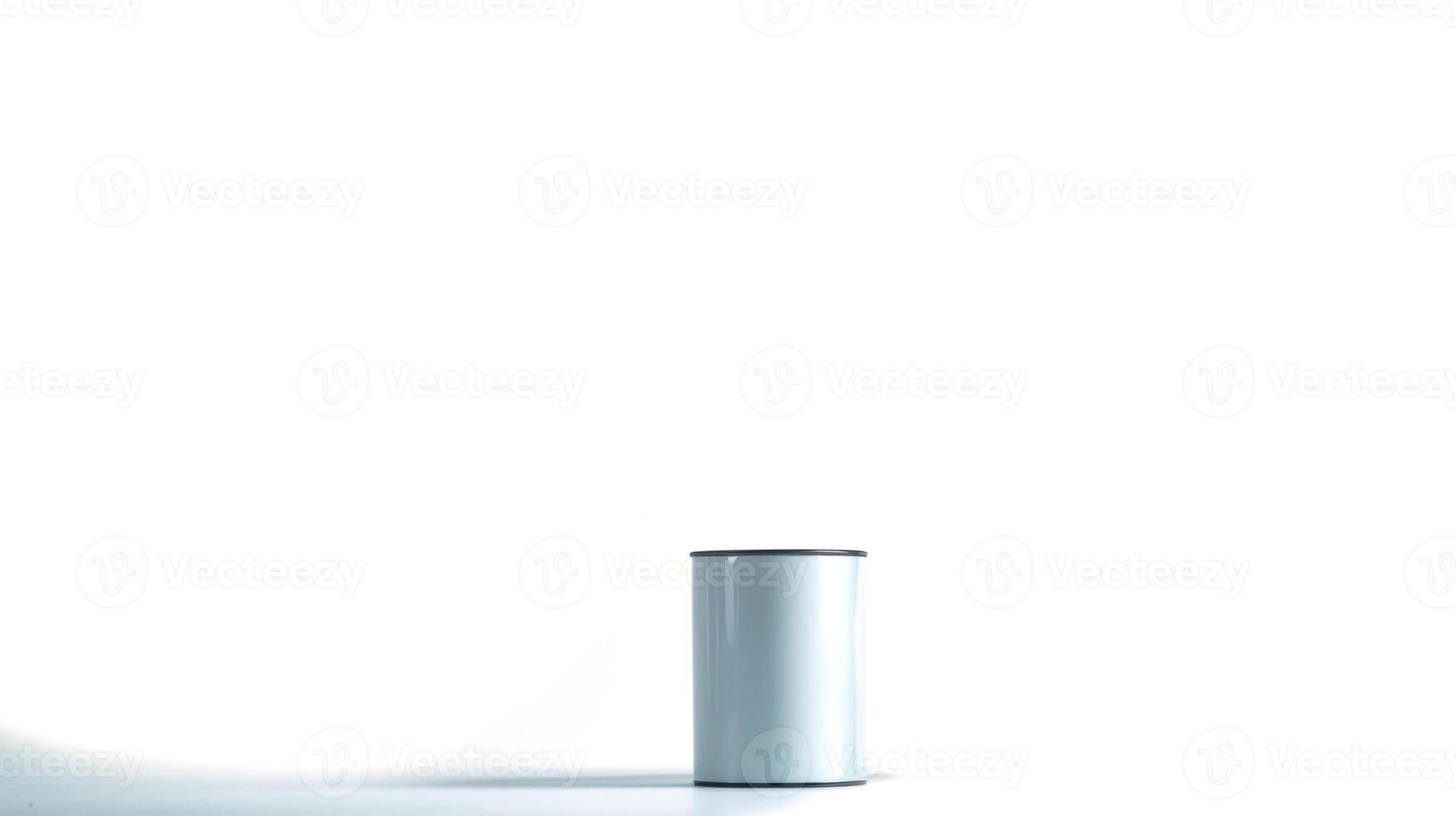 A sleek, unlabeled can of cat food stands prominently on a minimalistic surface, emphasizing its elegant design and quality. The setting is clean and neutral, drawing attention to the product photo