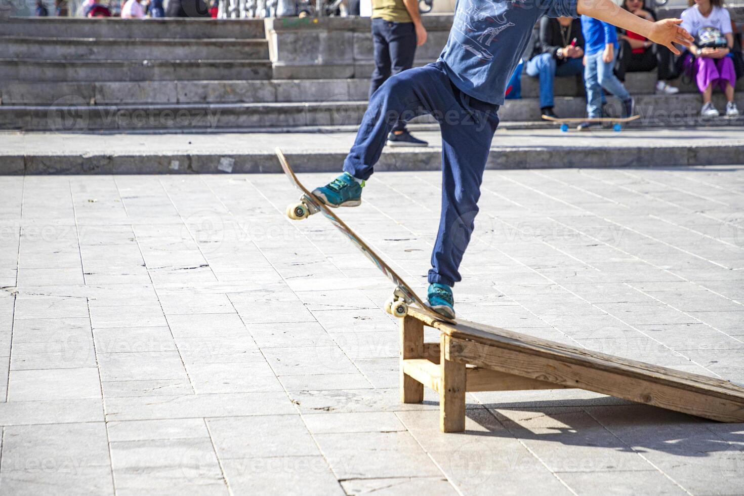 cool skateboard jump at a public park photo