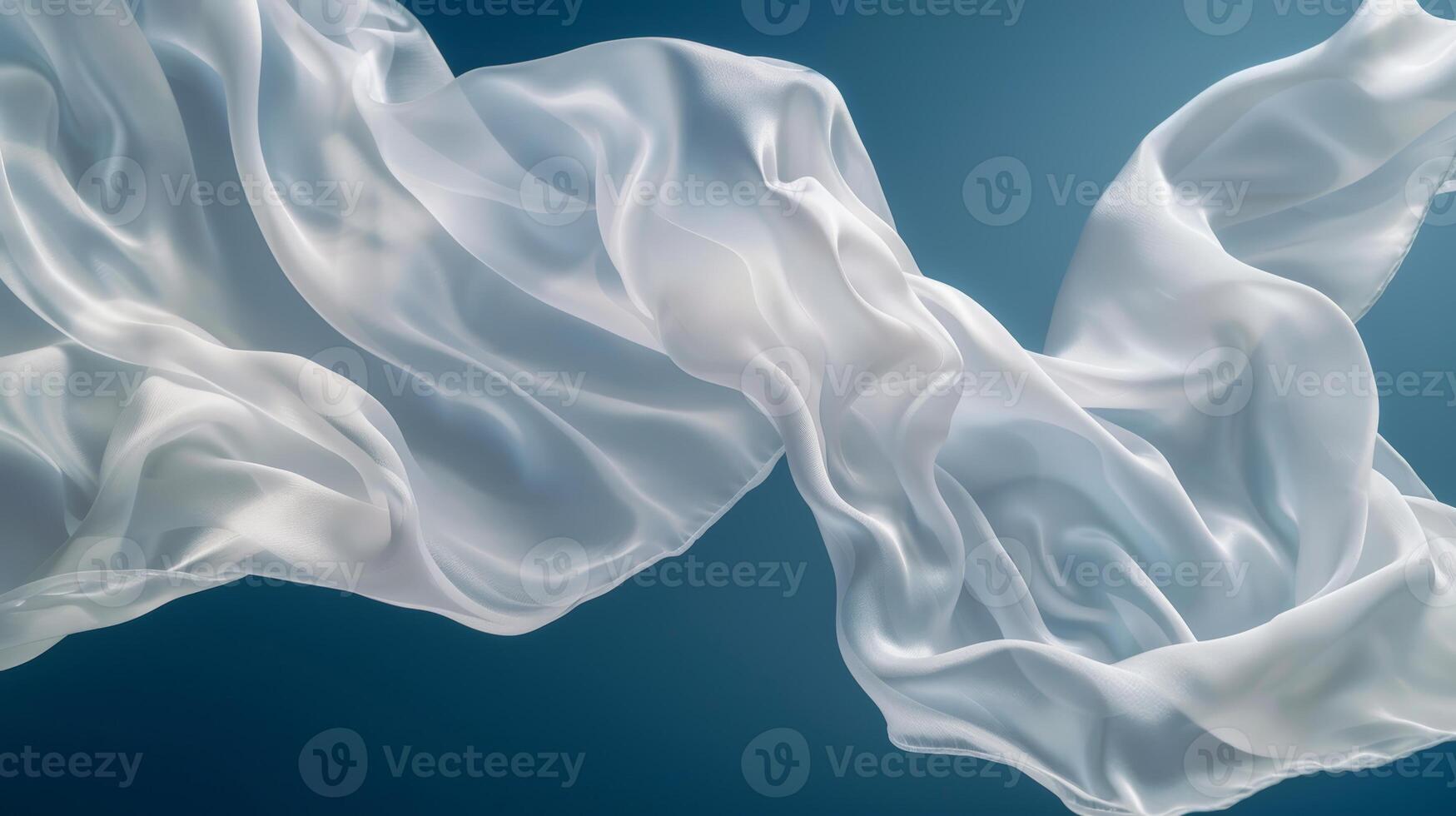 White silk satin cloths are elegantly suspended in mid-air, undulating softly, creating a tranquil atmosphere against a calming blue background, capturing the beauty of fabric in motion photo