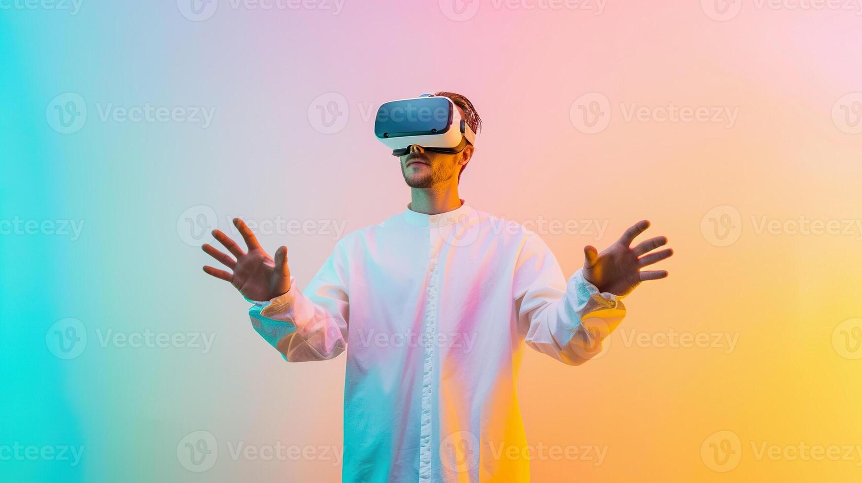 blond man dressed in white interacts with a virtual reality headset in a vibrant background photo