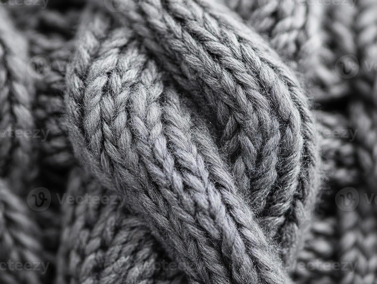 Monochrome Knitted Texture with braided patterns. photo