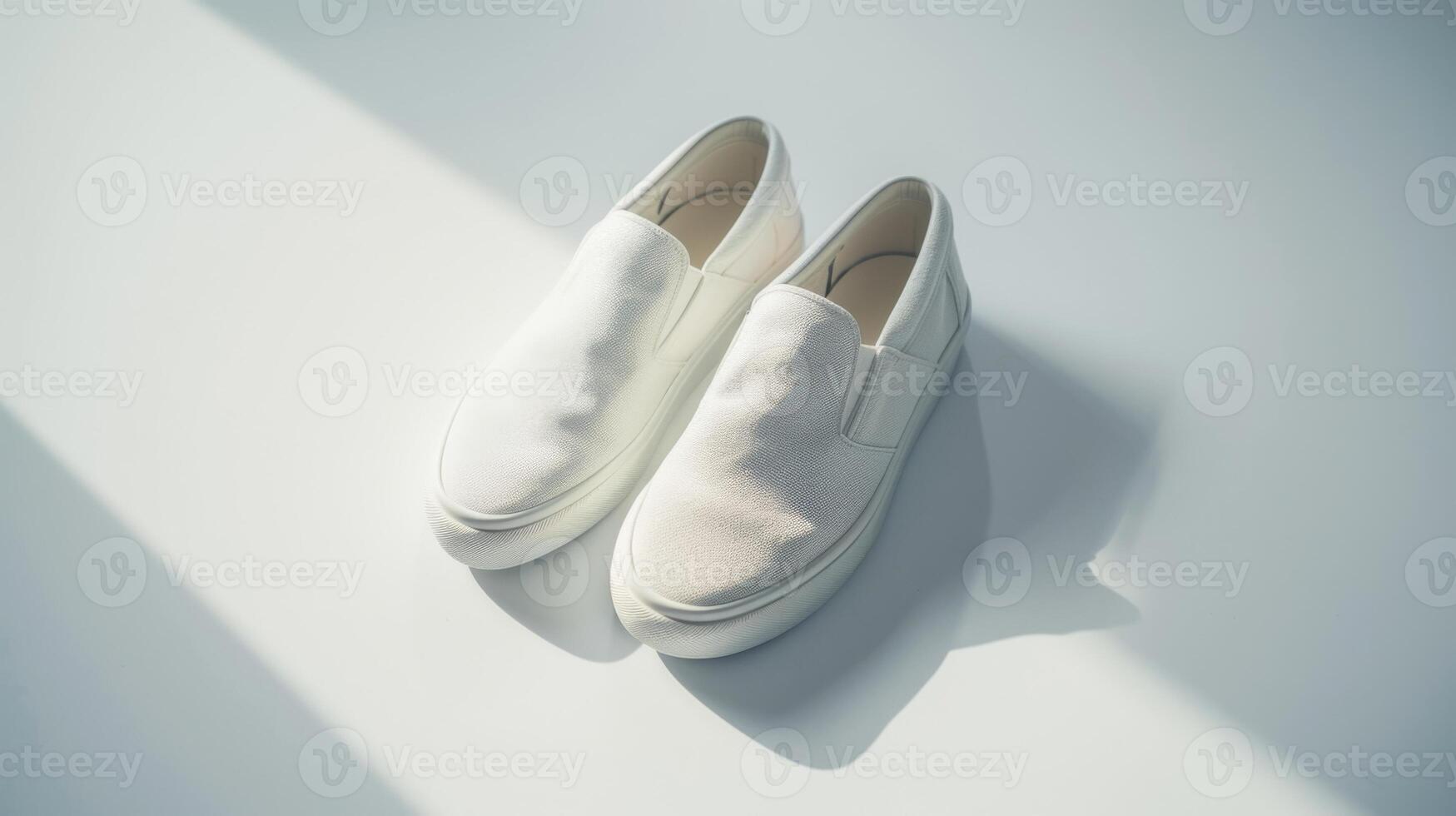 This pair of comfortable white shoes features a sleek design, perfect for travel and casual wear. Ideal for those seeking practicality and style while exploring new places photo
