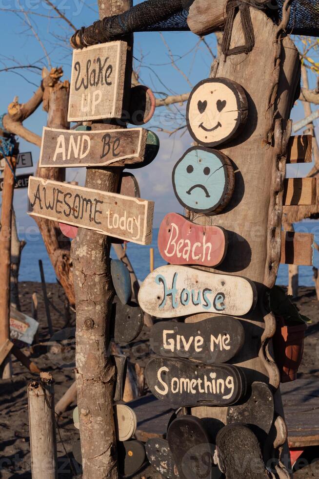 emoticon sign made of wood, decoration for cafe photo