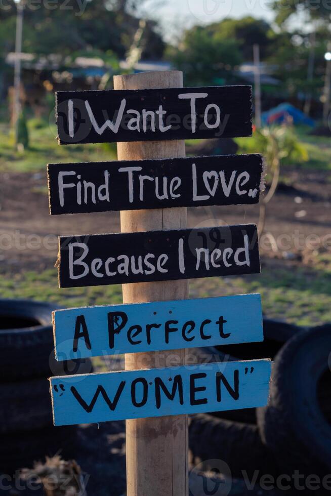 Wooden signs with motivational quotes, inspiration and ideas, decoration for cafe photo
