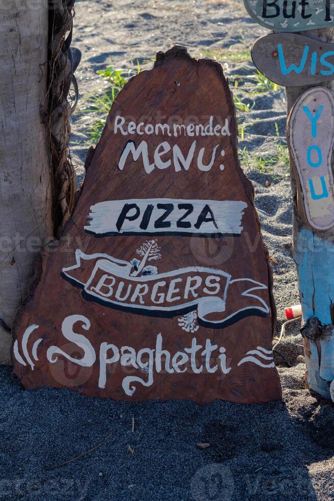 Wooden signs with motivational quotes, inspiration and ideas, decoration for cafe photo