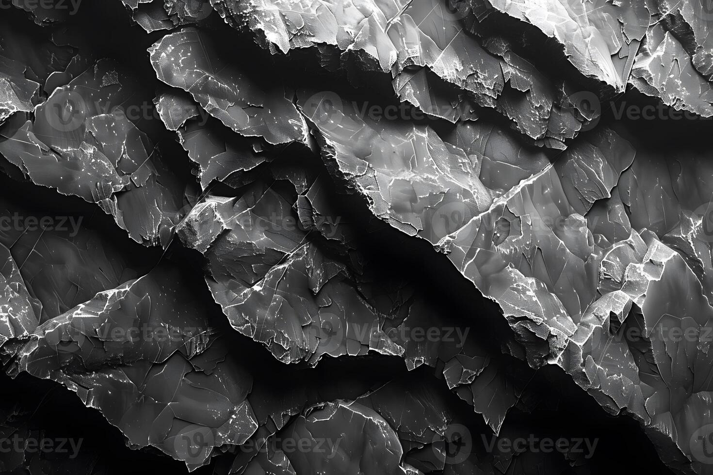 Abstract Layers of Cracked Black and White Surface with Sharp Edges for Creative Background Design photo