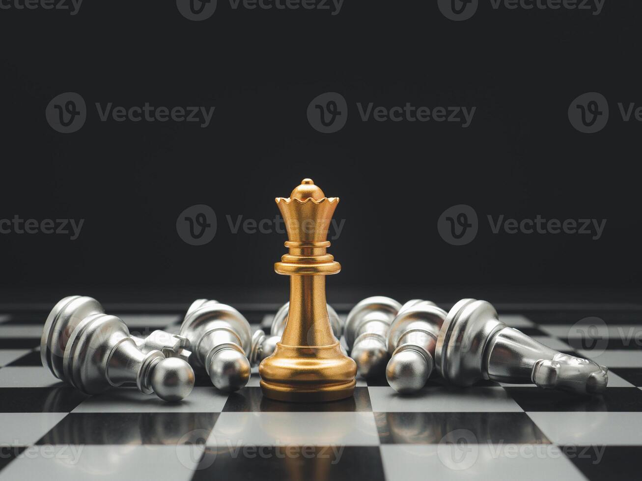 Chess pieces on board game planning and competition on black background photo