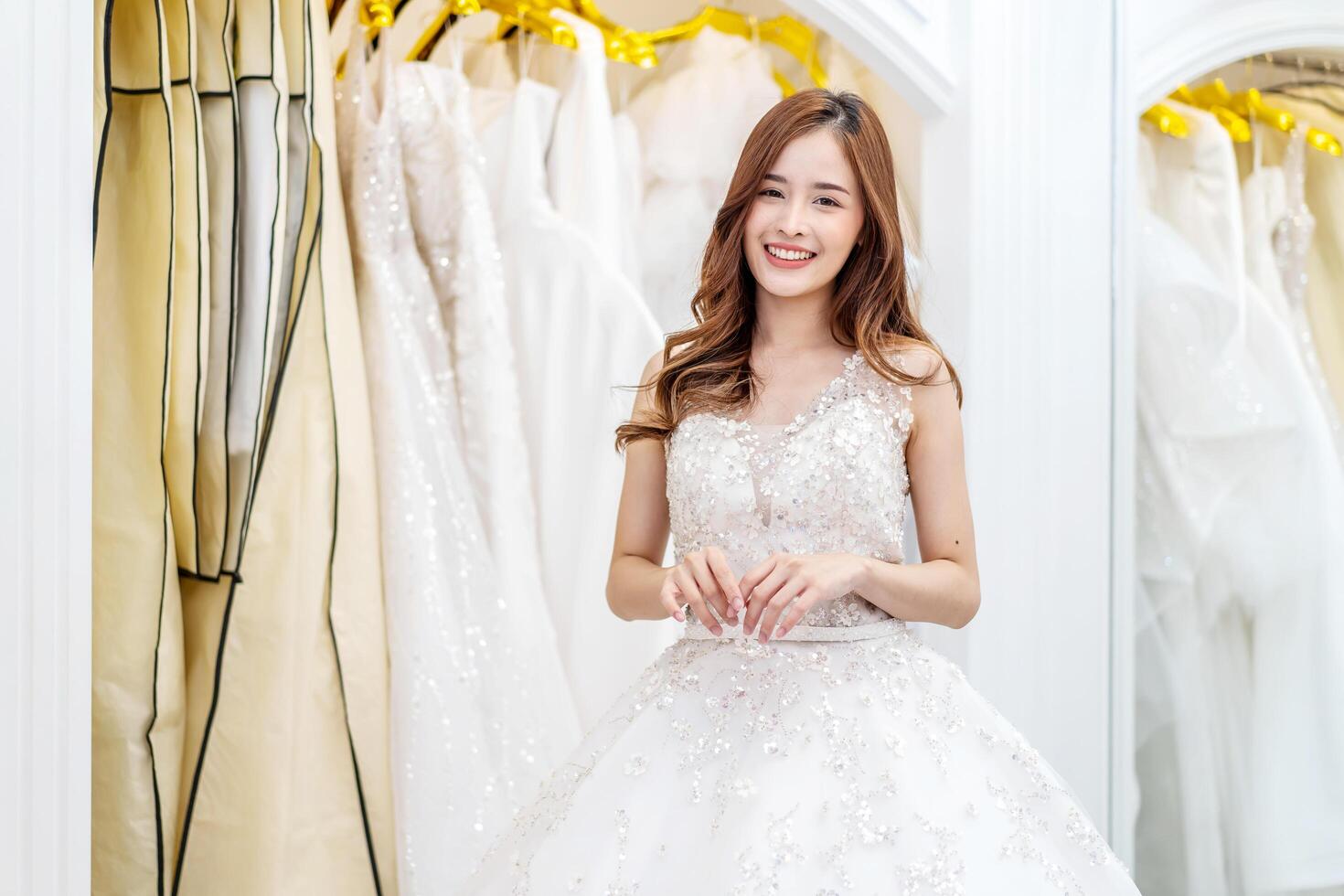 Portrait of beautiful asian bride happy, woman in wedding day posing, enjoying the celebration, Happy woman in wedding day theme concept photo