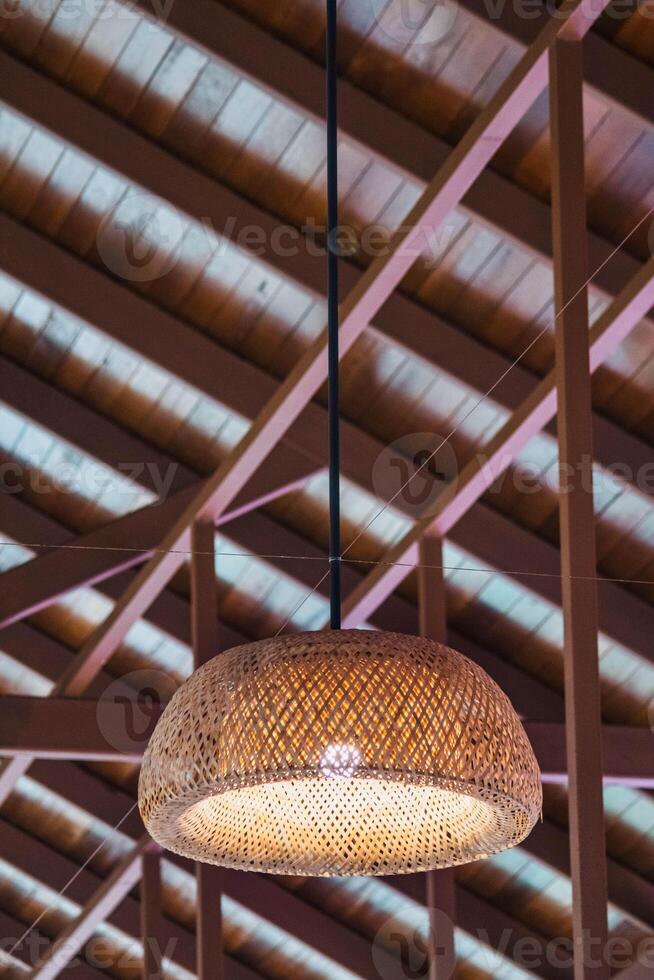 Woven lamp on Wooden Ceiling photo